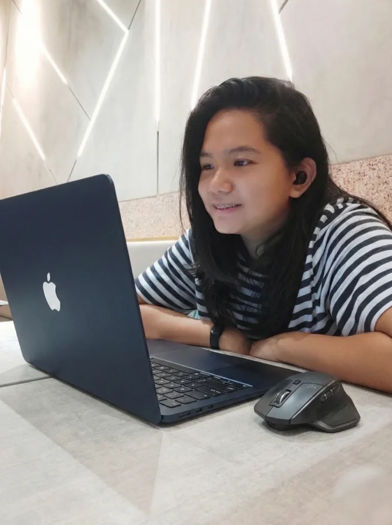 Camille at her desk